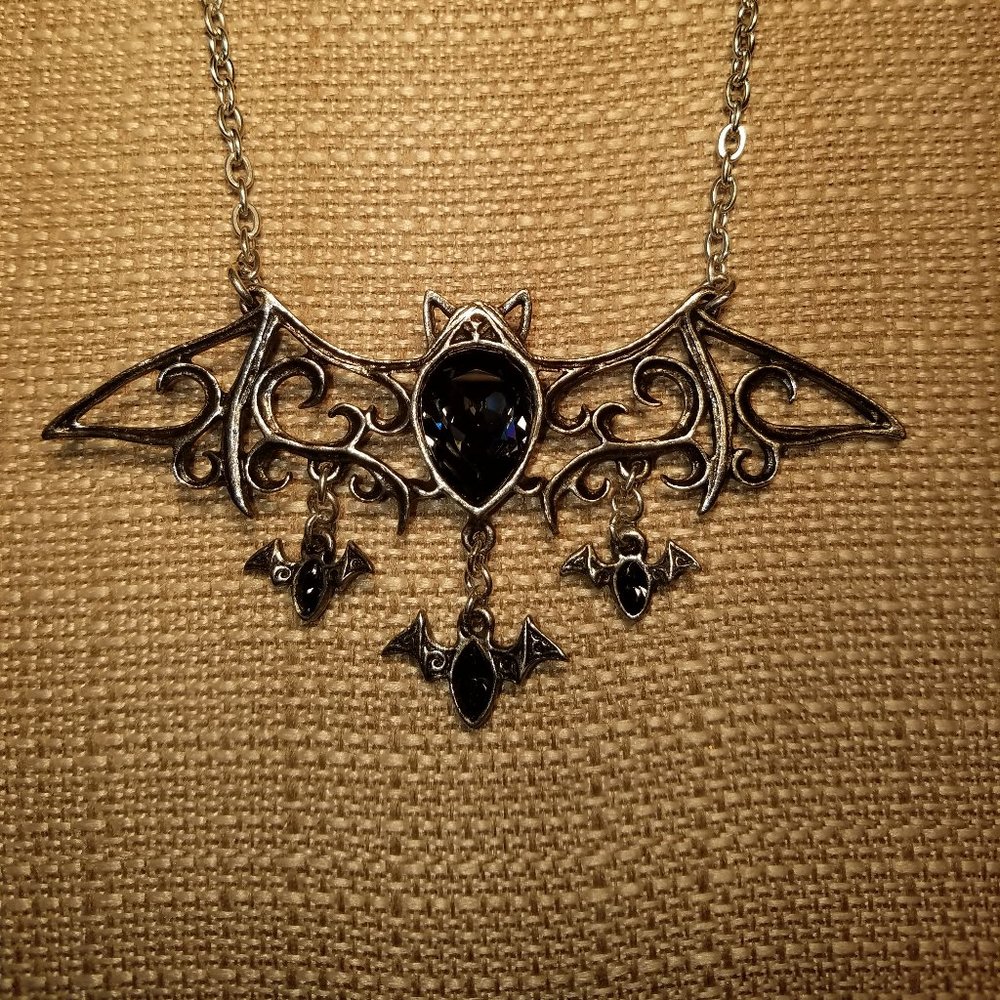 Pewter Necklace with chain attached.